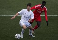 MADRID, SPAIN - MARCH 08: Jaime Seoane (L) of Real Madrid CFa competes for the ball with Jose Gomes (R) of SL Benfica during the UEFA Youth League Quarter Finals match between  Real Madrid CF and SL Benfica at Estadio Alfredo Di Stefano on March 8, 2016 in Madrid, Spain.  (Photo by Gonzalo Arroyo Moreno/Getty Images)